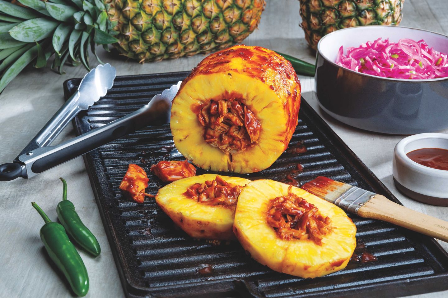 BBQ Chicken Stuffed Smoked Pineapple with Spicy Quick Pickled Cabbage